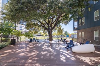 Shaded community patio at abstract at design district in dallas tx, 75207
